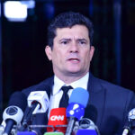 blindagem se escreve com G